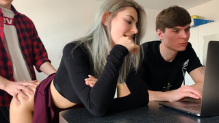 The boy is so busy that he does not notice how his gf is being spiked next to him