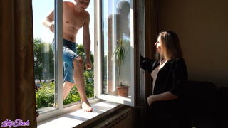 The hubby is preparing dinner and does not know that his wifey is screwing with a window cleaner